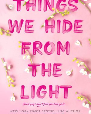 Book cover of Things We Hide from the Light by Lucy Score — a small-town romance novel about love, healing, and redemption.