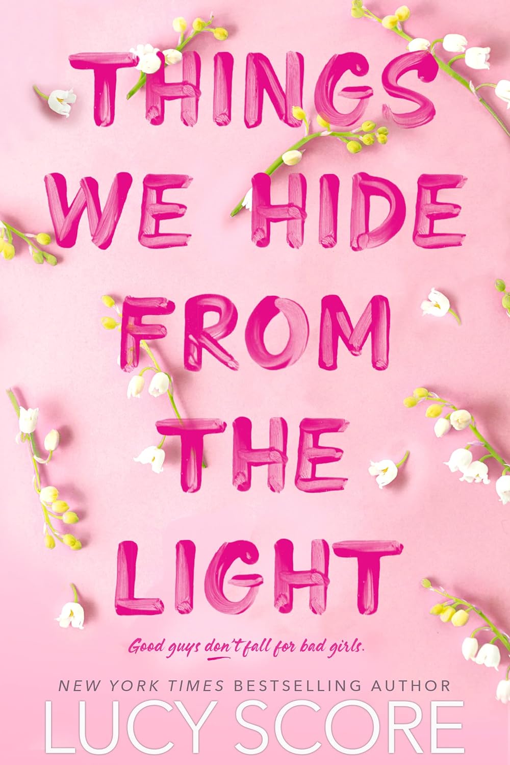 Book cover of Things We Hide from the Light by Lucy Score — a small-town romance novel about love, healing, and redemption.